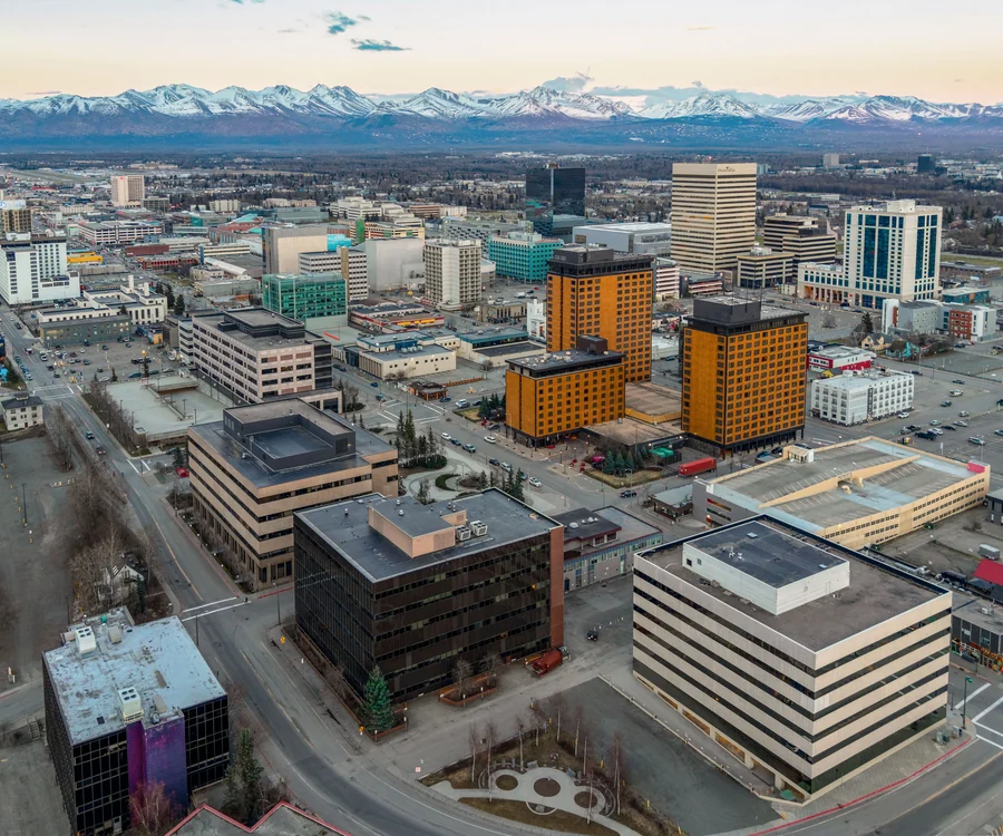 Downtown Anchorage Alaska skyline backed by the Chugach Mountains