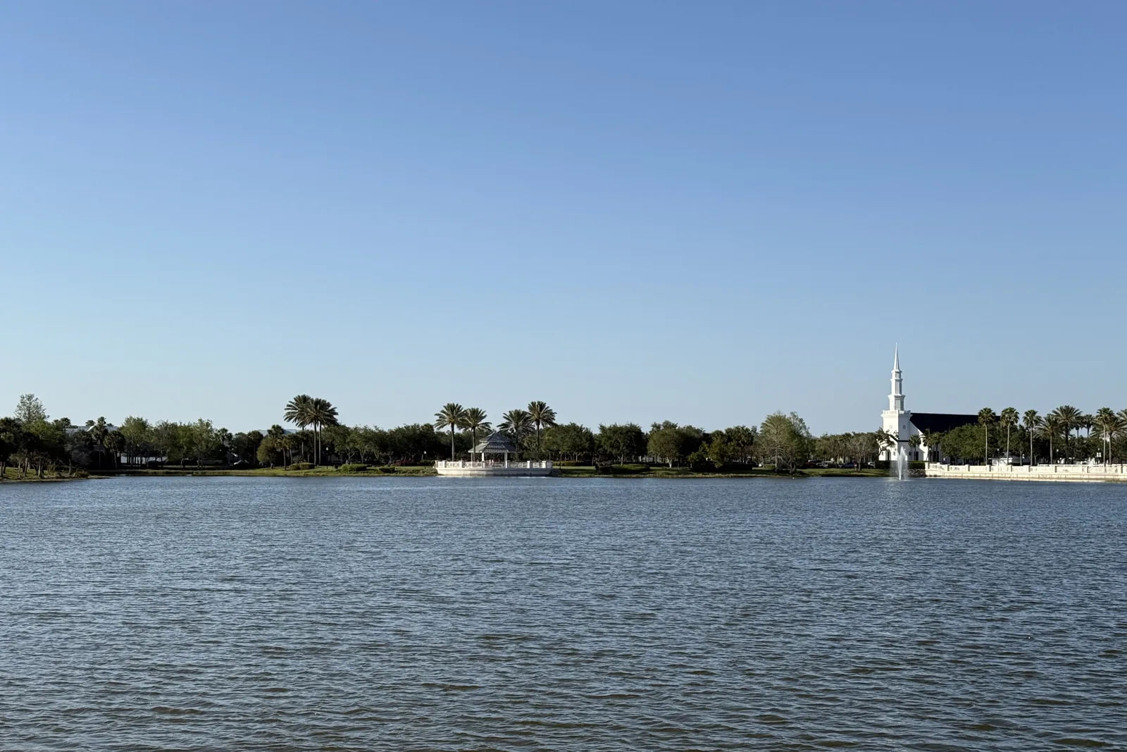 Lake Tradition in Port St. Lucie with a gazebo and a white church steeple on the far shore