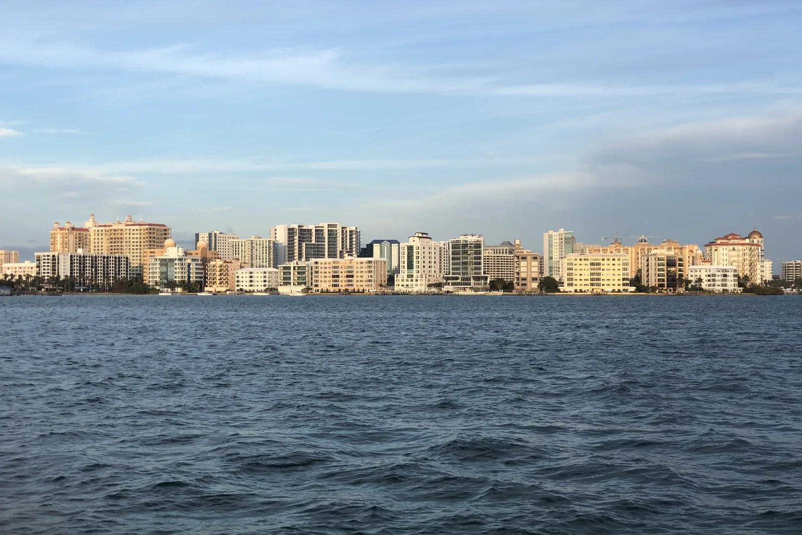 Downtown Sarasota skyline of condo and hotel towers seen across Sarasota Bay