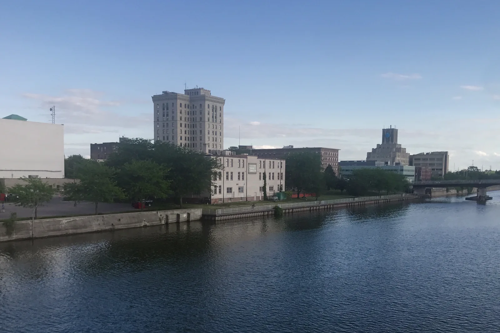 Downtown Saginaw skyline across the Saginaw River on a clear summer evening