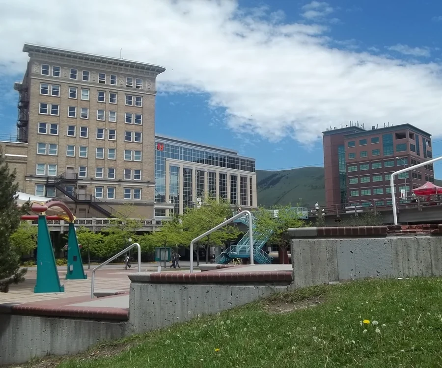 Downtown Missoula, Montana with Caras Park and mountains