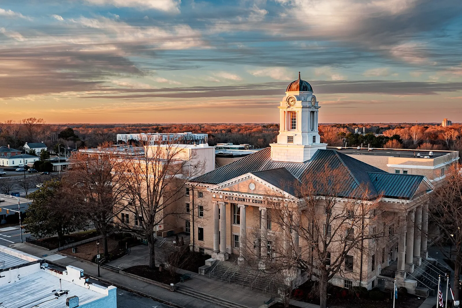 Pitt County Courthouse and its clock tower in Greenville, North Carolina, seen from above in low evening light