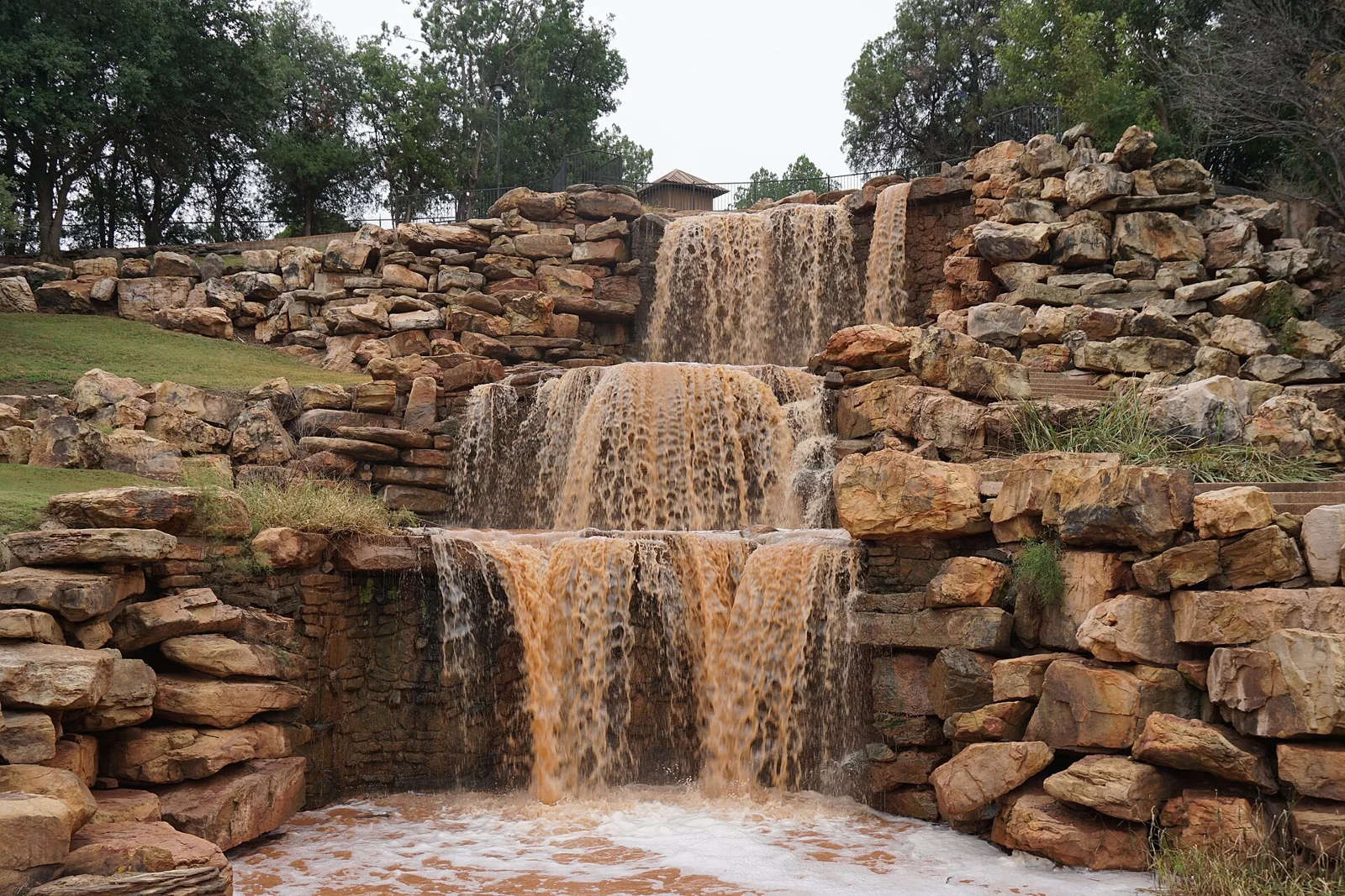 The Falls in Lucy Park, the rebuilt cascade on the Wichita River in Wichita Falls, pouring over tiers of tan limestone