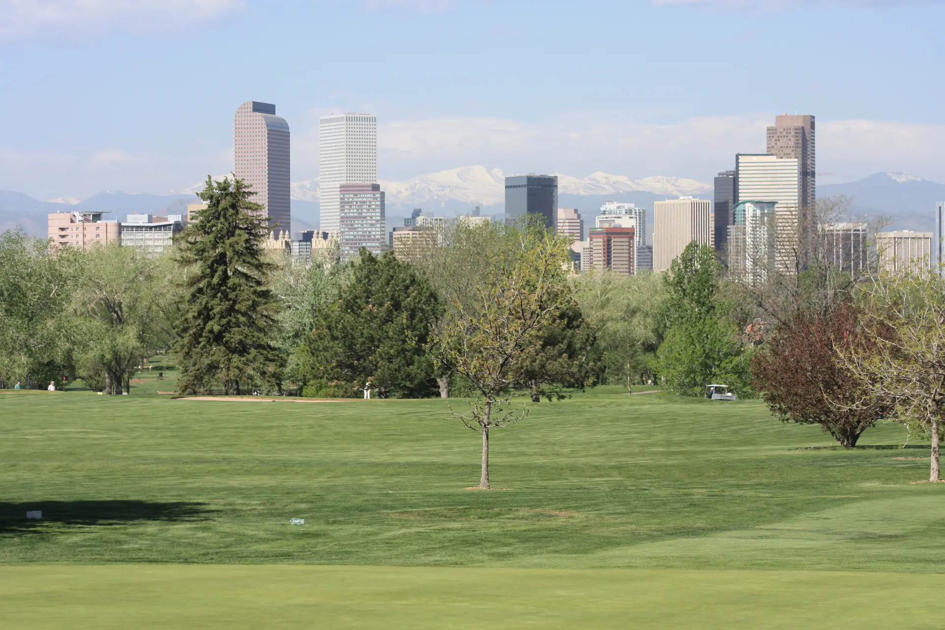The Denver skyline southeast of Berkeley in northwest Denver, where Propcash buys older bungalows for cash.