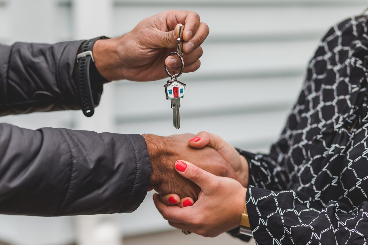 Keys handed over as a house sale closes with Propcash