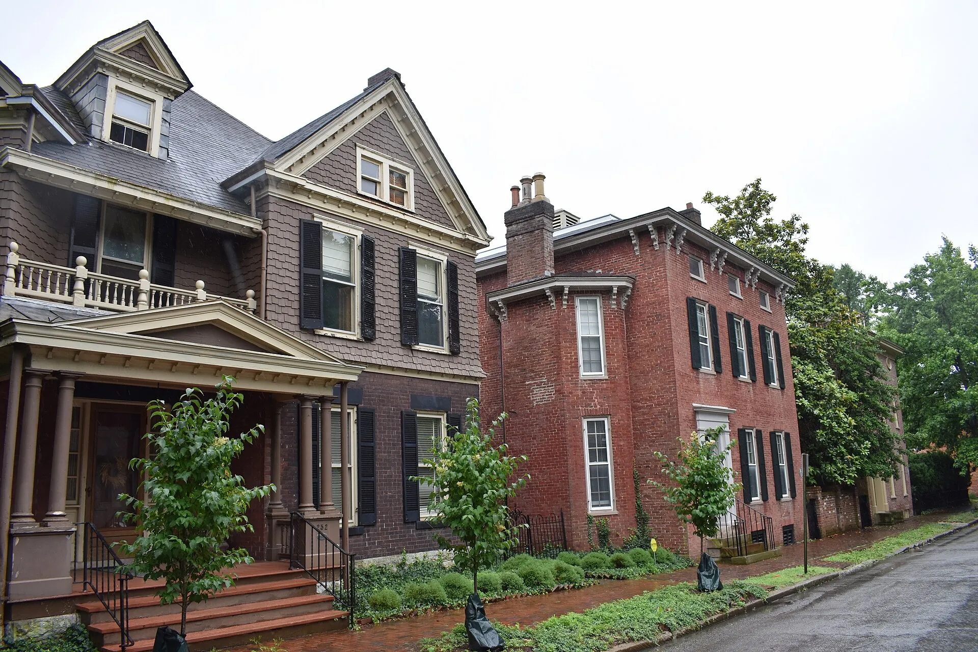 Nineteenth-century brick and shingled houses along a street in Lexington's Gratz Park Historic District