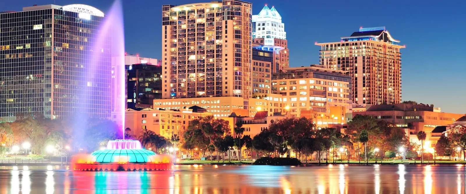Downtown Orlando, Florida skyline and the Lake Eola fountain at night