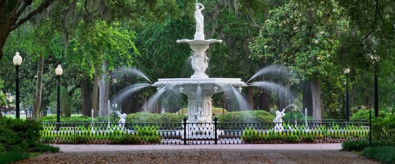 The Forsyth Park fountain under live oaks in Savannah, Georgia
