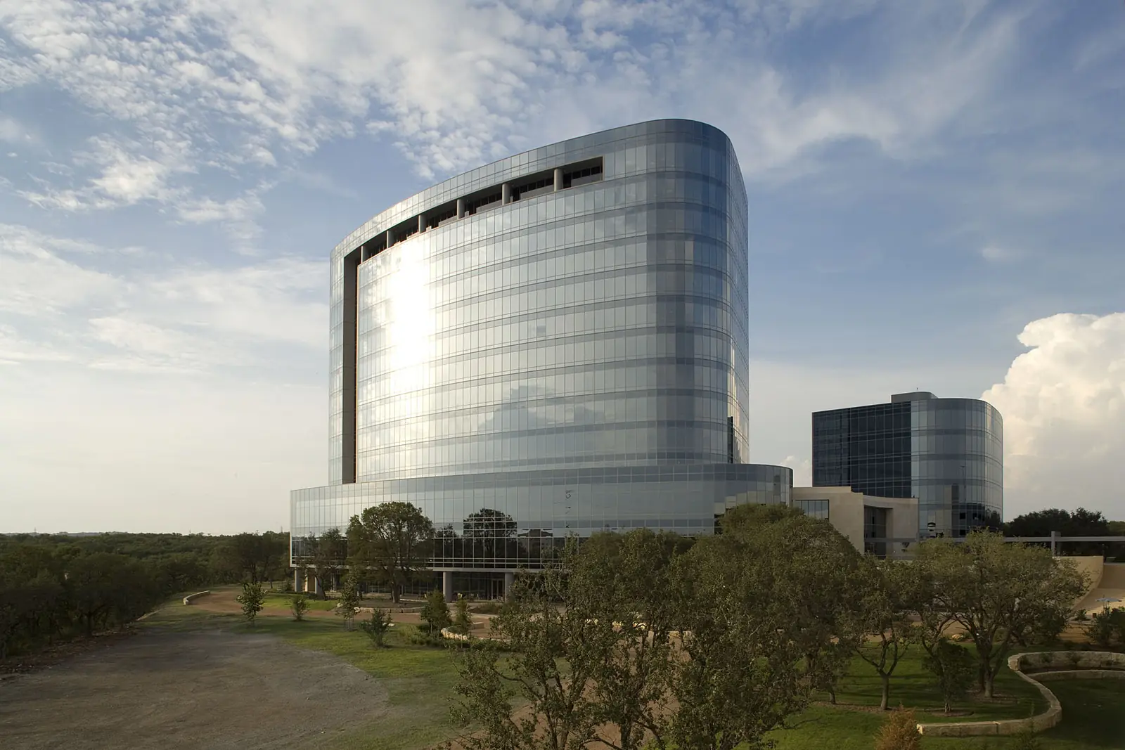 Office tower among oaks on the US 281 corridor near Stone Oak